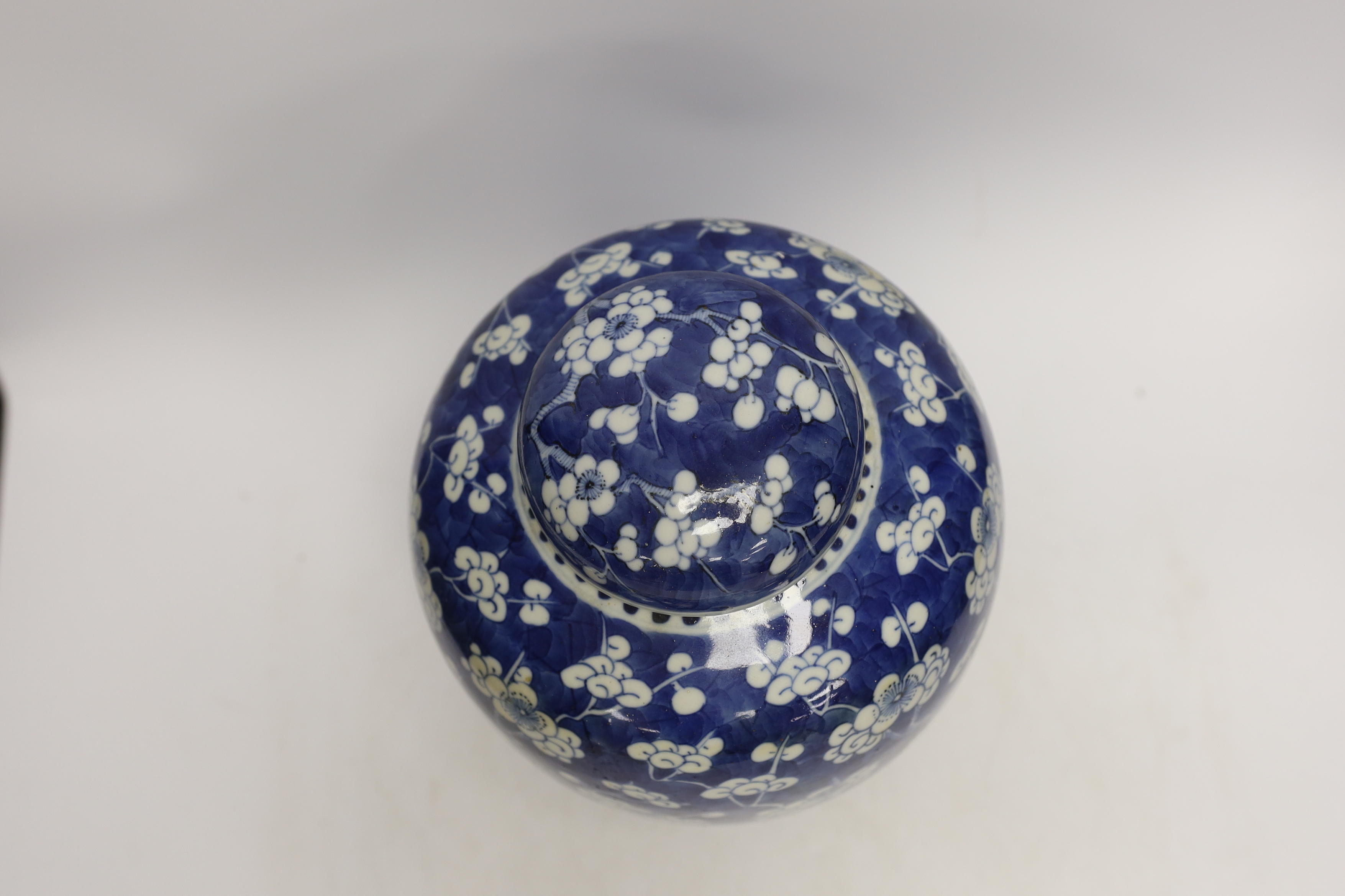 A Chinese blue and white prunus jar and cover, late 19th/early 20th century, 29cm high